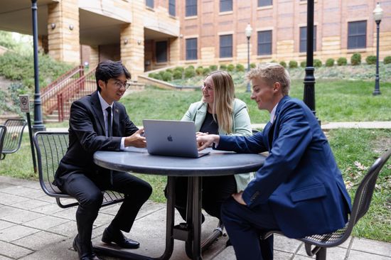 students in the SFHB courtyard