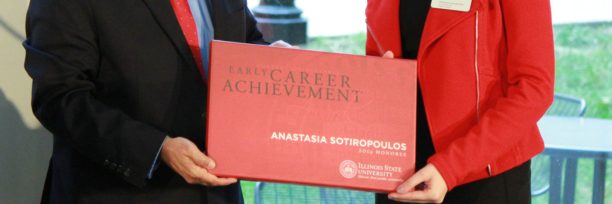 Student Anastasia Sotiropoulos receiving an Early Career Achievement Awards.