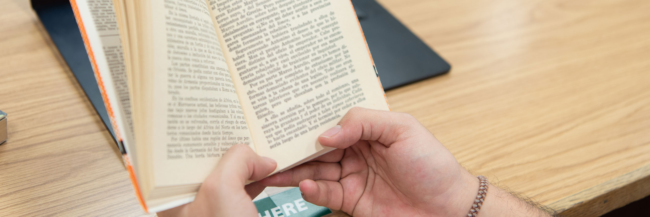 Man holding an open book