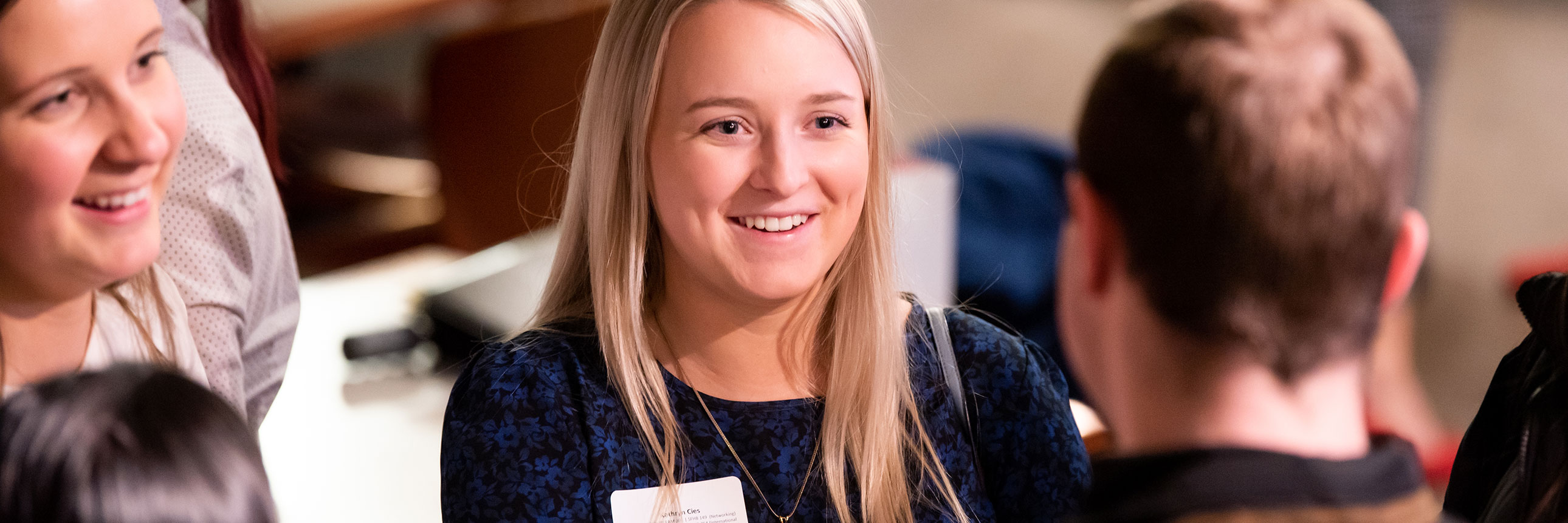 Students talking in a career event